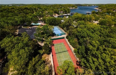Welcome to your dream full-time residence in the heart of Four on Tan-Tar-A Golf Club in Missouri - for sale on GolfHomes.com, golf home, golf lot