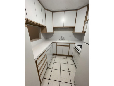Well maintained BOTTOM floor condo on the end of the building on Slick Rock Golf Course - Horseshoe Bay in Texas - for sale on GolfHomes.com, golf home, golf lot