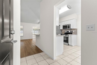 Perfect, completely updated 1,261square foot home sitting on the on Tampa Bay Golf and Country Club in Florida - for sale on GolfHomes.com, golf home, golf lot