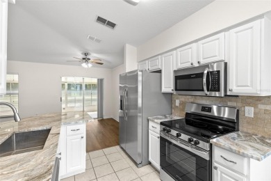 Perfect, completely updated 1,261square foot home sitting on the on Tampa Bay Golf and Country Club in Florida - for sale on GolfHomes.com, golf home, golf lot