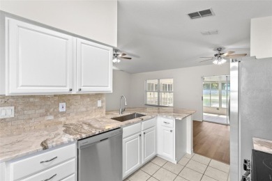 Perfect, completely updated 1,261square foot home sitting on the on Tampa Bay Golf and Country Club in Florida - for sale on GolfHomes.com, golf home, golf lot