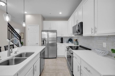 Welcome to this beautifully updated end-unit townhome, perfectly on Wedgefield Golf Club in Florida - for sale on GolfHomes.com, golf home, golf lot