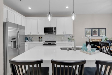Welcome to this beautifully updated end-unit townhome, perfectly on Wedgefield Golf Club in Florida - for sale on GolfHomes.com, golf home, golf lot