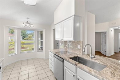 Perfect, completely updated 1,261square foot home sitting on the on Tampa Bay Golf and Country Club in Florida - for sale on GolfHomes.com, golf home, golf lot