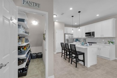 Welcome to this beautifully updated end-unit townhome, perfectly on Wedgefield Golf Club in Florida - for sale on GolfHomes.com, golf home, golf lot