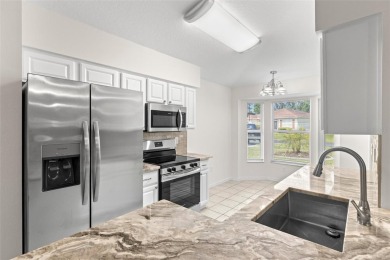 Perfect, completely updated 1,261square foot home sitting on the on Tampa Bay Golf and Country Club in Florida - for sale on GolfHomes.com, golf home, golf lot