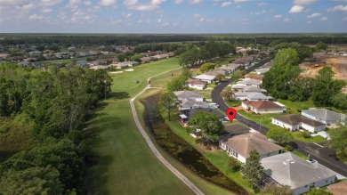 Perfect, completely updated 1,261square foot home sitting on the on Tampa Bay Golf and Country Club in Florida - for sale on GolfHomes.com, golf home, golf lot