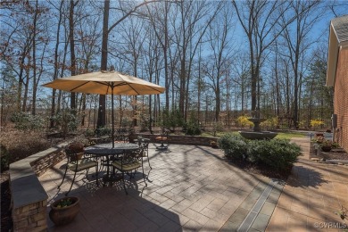 Beautiful all brick custom home is set back from the road and on The Foundry Golf Club in Virginia - for sale on GolfHomes.com, golf home, golf lot