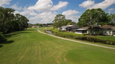 Perfect, completely updated 1,261square foot home sitting on the on Tampa Bay Golf and Country Club in Florida - for sale on GolfHomes.com, golf home, golf lot