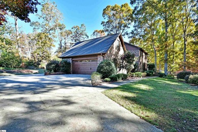 Discover this beautifully crafted all-brick 5-bedroom, 3-bath on Holly Tree Country Club in South Carolina - for sale on GolfHomes.com, golf home, golf lot