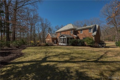 Beautiful all brick custom home is set back from the road and on The Foundry Golf Club in Virginia - for sale on GolfHomes.com, golf home, golf lot