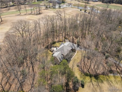 Beautiful all brick custom home is set back from the road and on The Foundry Golf Club in Virginia - for sale on GolfHomes.com, golf home, golf lot