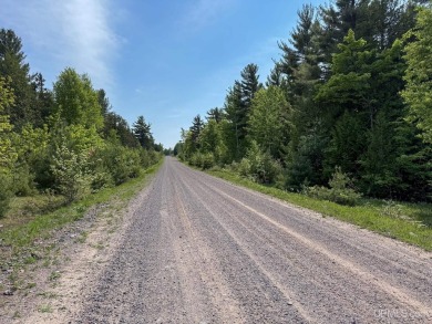 This attractive Keweenaw parcel is ready for your next getaway on Sandy Pebbles Golf Course in Michigan - for sale on GolfHomes.com, golf home, golf lot