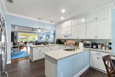 This charming home is located on a quaint street in the gated on Grand Haven Golf Club in Florida - for sale on GolfHomes.com, golf home, golf lot