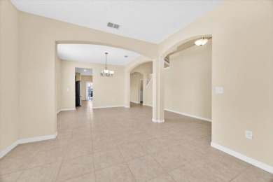 Stunning 5-bedroom, 3-bath home located in the highly on Providence Golf Club in Florida - for sale on GolfHomes.com, golf home, golf lot