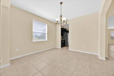 Stunning 5-bedroom, 3-bath home located in the highly on Providence Golf Club in Florida - for sale on GolfHomes.com, golf home, golf lot