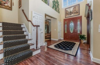 Set on a private cul-de-sac, this beautifully designed home on Stanton Ridge Golf and Country Club in New Jersey - for sale on GolfHomes.com, golf home, golf lot
