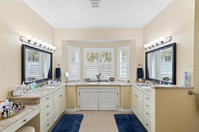 This charming home is located on a quaint street in the gated on Grand Haven Golf Club in Florida - for sale on GolfHomes.com, golf home, golf lot