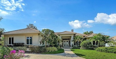 This beautiful John Cannon home has arguably the best water on University Park Country Club in Florida - for sale on GolfHomes.com, golf home, golf lot