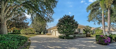 This beautiful John Cannon home has arguably the best water on University Park Country Club in Florida - for sale on GolfHomes.com, golf home, golf lot