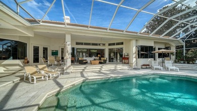 This beautiful John Cannon home has arguably the best water on University Park Country Club in Florida - for sale on GolfHomes.com, golf home, golf lot