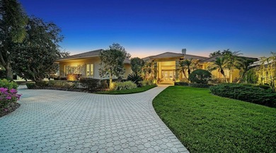 This beautiful John Cannon home has arguably the best water on University Park Country Club in Florida - for sale on GolfHomes.com, golf home, golf lot