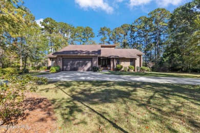 Beautiful custom-built coastal retreat that offers rare privacy on Carolina Shores Golf Course in North Carolina - for sale on GolfHomes.com, golf home, golf lot