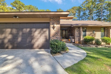 Beautiful custom-built coastal retreat that offers rare privacy on Carolina Shores Golf Course in North Carolina - for sale on GolfHomes.com, golf home, golf lot