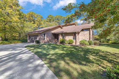 Beautiful custom-built coastal retreat that offers rare privacy on Carolina Shores Golf Course in North Carolina - for sale on GolfHomes.com, golf home, golf lot