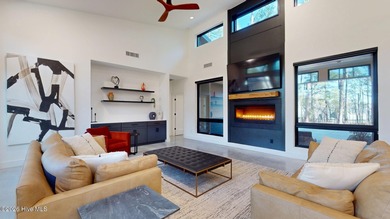 Experience the ultimate in Contemporary Living. This on Forest Creek Golf Club  in North Carolina - for sale on GolfHomes.com, golf home, golf lot