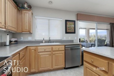 Located in the gated community of Sunset Greens, this on CasaBlanca Resort and Casino in Nevada - for sale on GolfHomes.com, golf home, golf lot