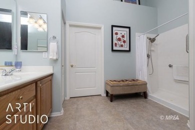 Located in the gated community of Sunset Greens, this on CasaBlanca Resort and Casino in Nevada - for sale on GolfHomes.com, golf home, golf lot