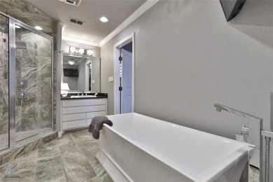 Discover luxury living in this exquisite 4-bedroom, 4-bathroom on Abilene Country Club - South Course in Texas - for sale on GolfHomes.com, golf home, golf lot