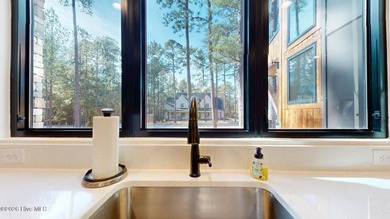 Experience the ultimate in Contemporary Living. This on Forest Creek Golf Club  in North Carolina - for sale on GolfHomes.com, golf home, golf lot