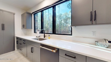 Experience the ultimate in Contemporary Living. This on Forest Creek Golf Club  in North Carolina - for sale on GolfHomes.com, golf home, golf lot