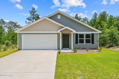 Tucked into a peaceful, wooded setting with no neighbors to the on Sunny Hills Golf and Country Club in Florida - for sale on GolfHomes.com, golf home, golf lot