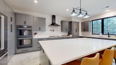 Experience the ultimate in Contemporary Living. This on Forest Creek Golf Club  in North Carolina - for sale on GolfHomes.com, golf home, golf lot