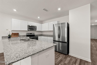 Tucked into a peaceful, wooded setting with no neighbors to the on Sunny Hills Golf and Country Club in Florida - for sale on GolfHomes.com, golf home, golf lot