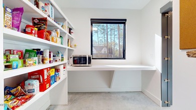 Experience the ultimate in Contemporary Living. This on Forest Creek Golf Club  in North Carolina - for sale on GolfHomes.com, golf home, golf lot