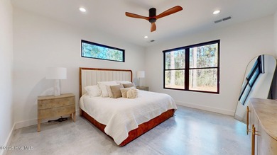 Experience the ultimate in Contemporary Living. This on Forest Creek Golf Club  in North Carolina - for sale on GolfHomes.com, golf home, golf lot