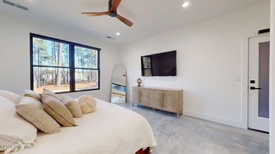 Experience the ultimate in Contemporary Living. This on Forest Creek Golf Club  in North Carolina - for sale on GolfHomes.com, golf home, golf lot