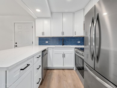 Freshly renovated second-floor lakefront unit offering the on River Bend Golf Club in Illinois - for sale on GolfHomes.com, golf home, golf lot