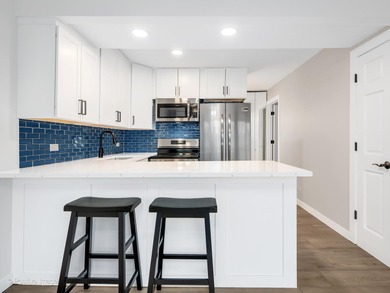 Freshly renovated second-floor lakefront unit offering the on River Bend Golf Club in Illinois - for sale on GolfHomes.com, golf home, golf lot