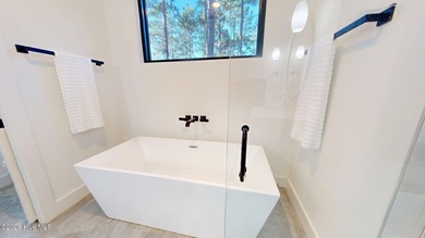 Experience the ultimate in Contemporary Living. This on Forest Creek Golf Club  in North Carolina - for sale on GolfHomes.com, golf home, golf lot