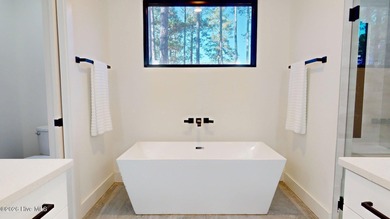 Experience the ultimate in Contemporary Living. This on Forest Creek Golf Club  in North Carolina - for sale on GolfHomes.com, golf home, golf lot