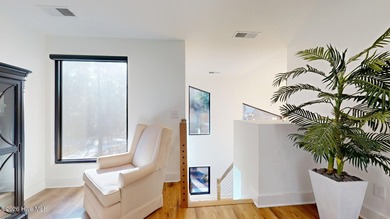 Experience the ultimate in Contemporary Living. This on Forest Creek Golf Club  in North Carolina - for sale on GolfHomes.com, golf home, golf lot