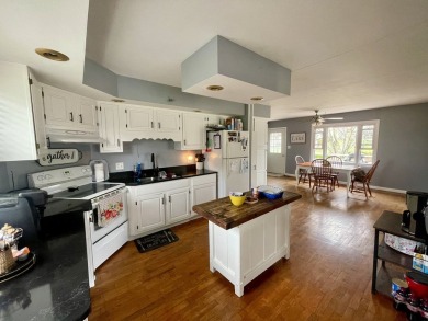 Experience the ultimate retreat in this captivating lakefront on Lakeview Country Club in Illinois - for sale on GolfHomes.com, golf home, golf lot