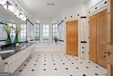 Tucked within the coveted gates of Country Club of the South on Country Club of the South in Georgia - for sale on GolfHomes.com, golf home, golf lot