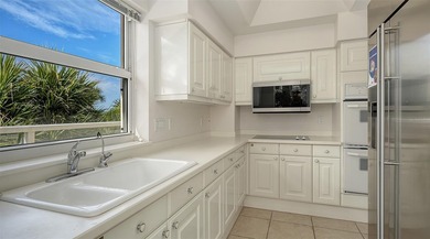 Defined by an exceptional indoor-outdoor connection, this on Longboat Key Golf Club Resort in Florida - for sale on GolfHomes.com, golf home, golf lot