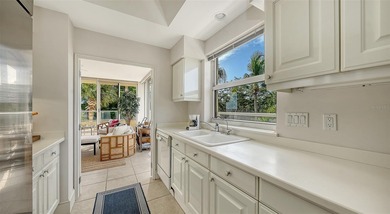 Defined by an exceptional indoor-outdoor connection, this on Longboat Key Golf Club Resort in Florida - for sale on GolfHomes.com, golf home, golf lot